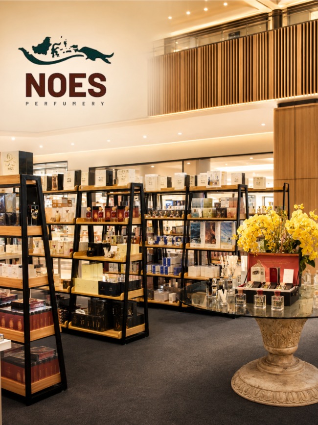 NOES Perfumery store interior with the brand mark on the wall
